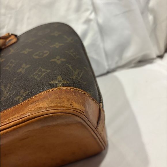 Louis Vuitton Alma Monogram Coated Canvas Handbag - Picture 9 of 16